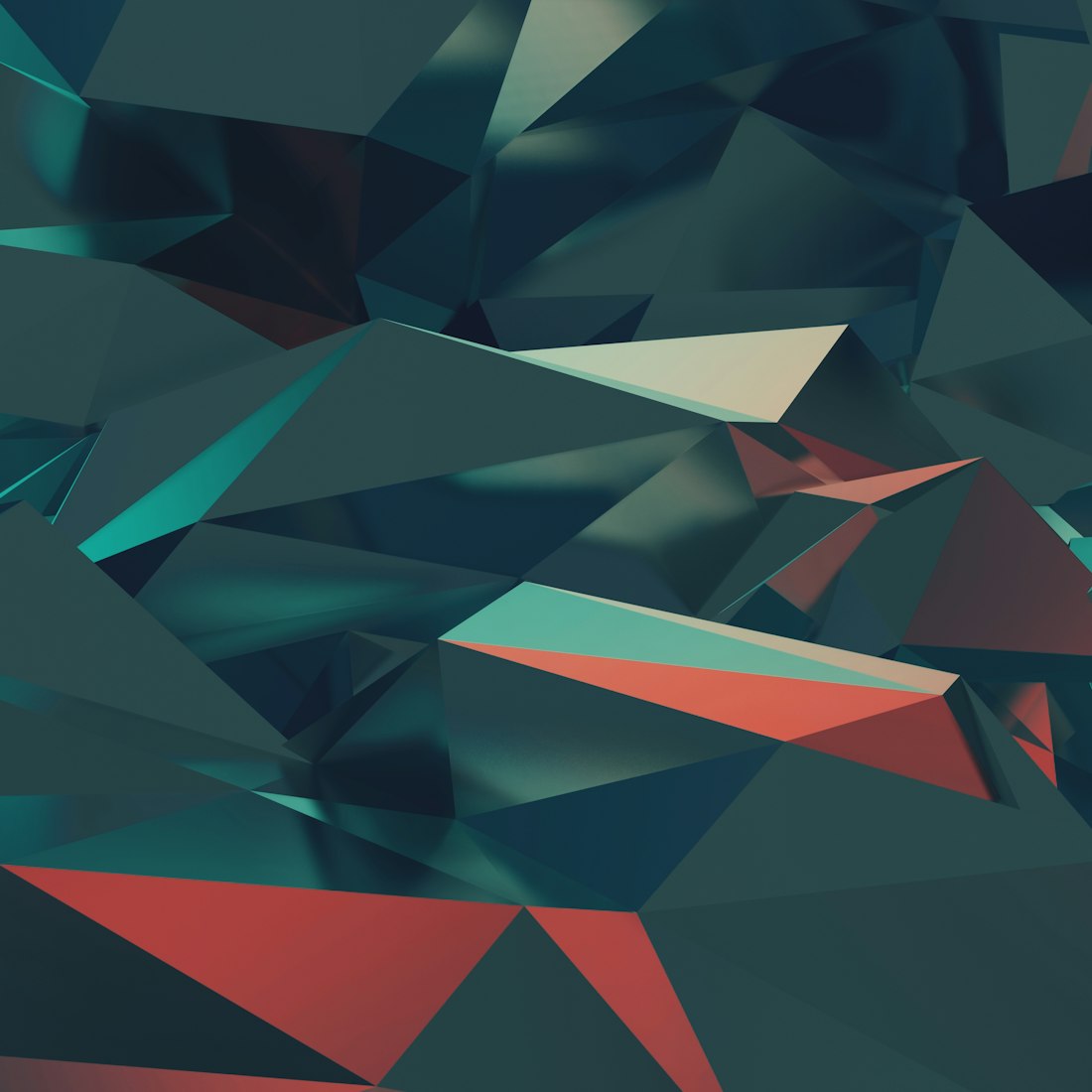 3-D metallic low-poly mountain reflecting colors of red-orange and blue-green